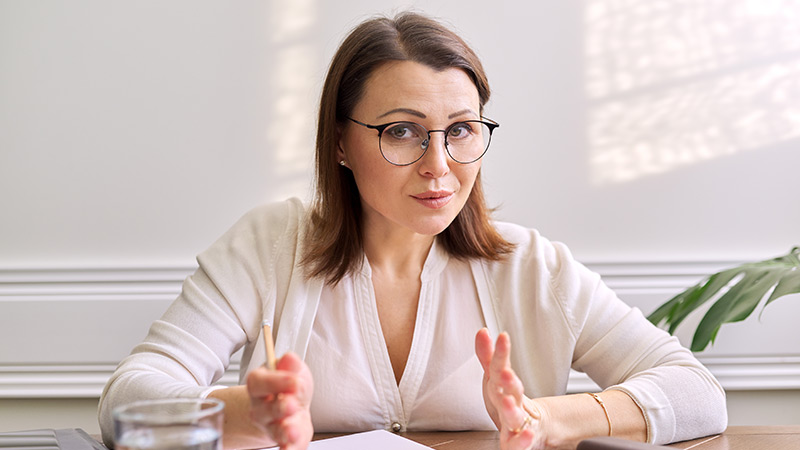 Close-up of female educational counsellor in the office