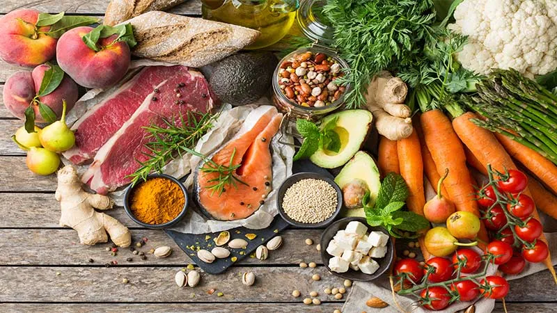 Healthy food ingredients for cooking on a kitchen table.