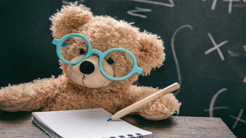 Maths lesson test concept represtns by a cute teddy