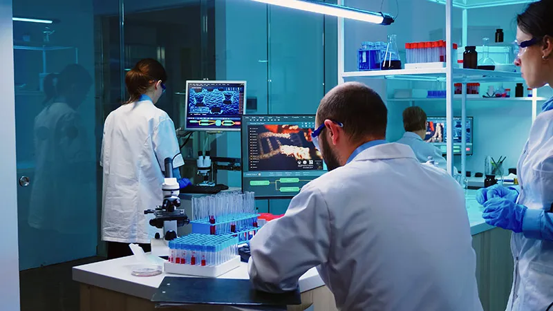 Scientist coworkers working in a modern laboratory