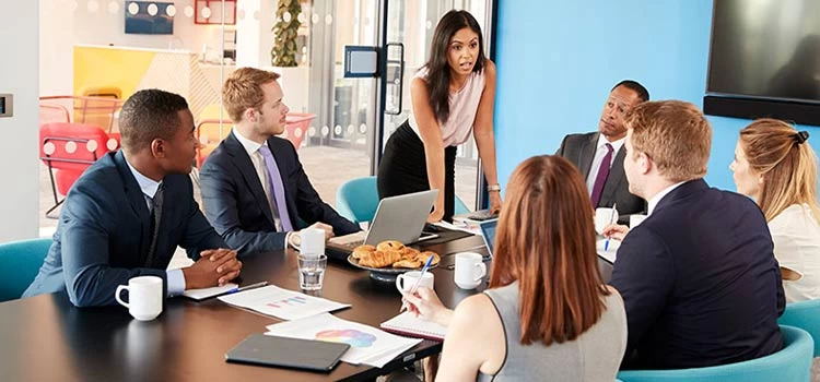 Female manager on a meeting with other colleagues