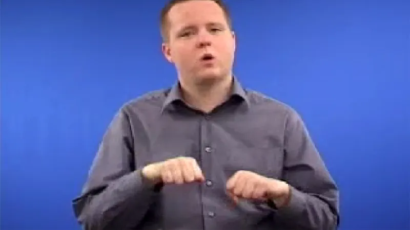 Sign language tutor showing hand gestures to sign Horse in British Sign Language
