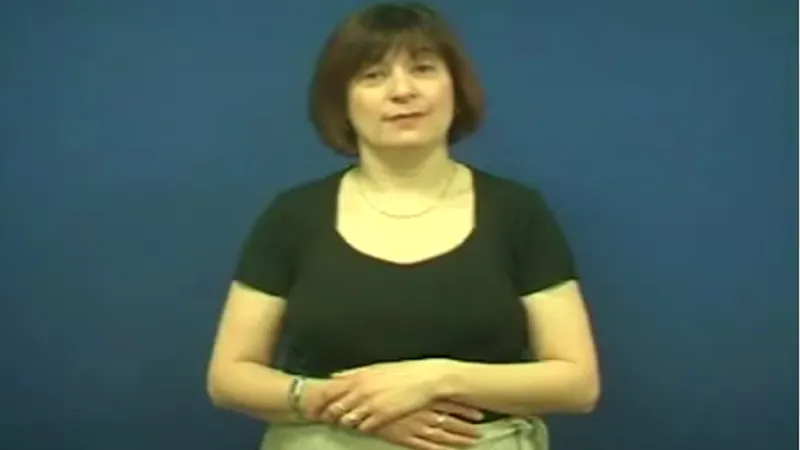 BSL interpreter in a steady posture