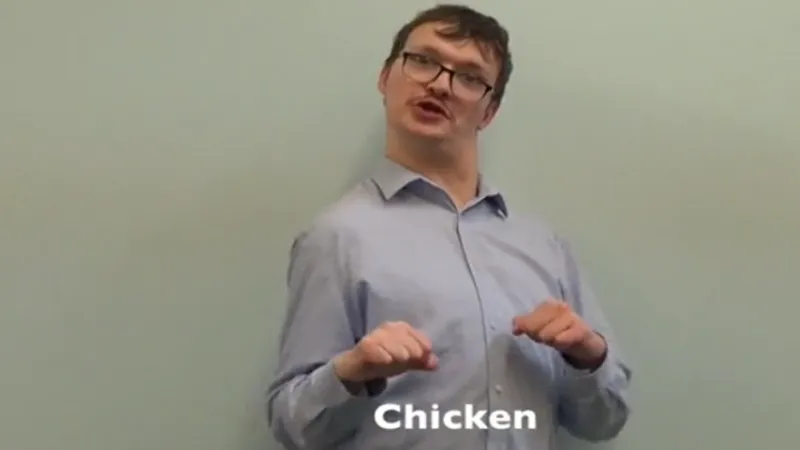 BSL teacher signing chicken