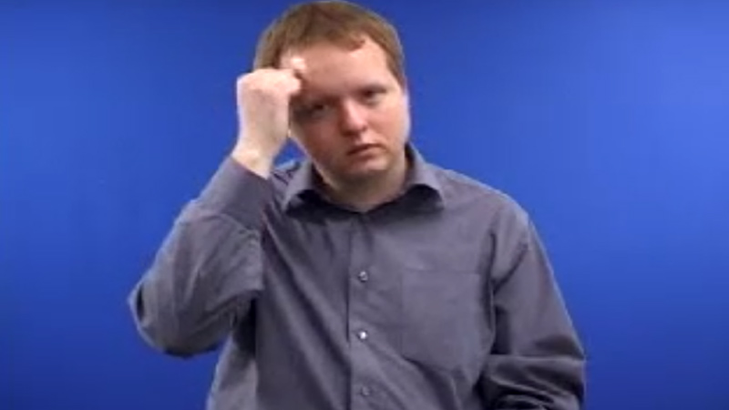 BSL teacher signing Idiot in British sign language