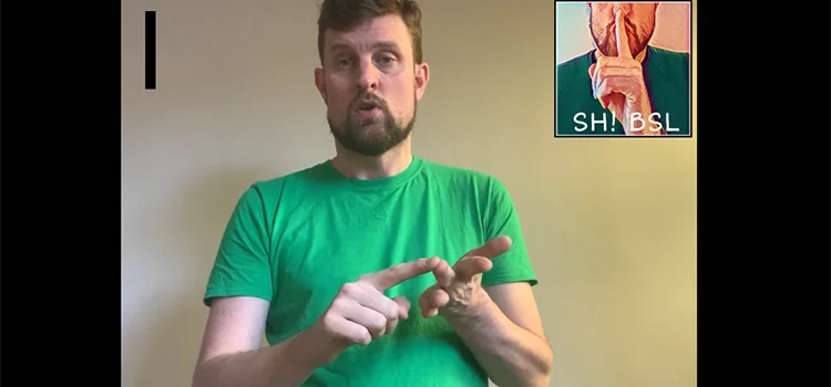 A Man Demonstrating How to Sign the Letter I