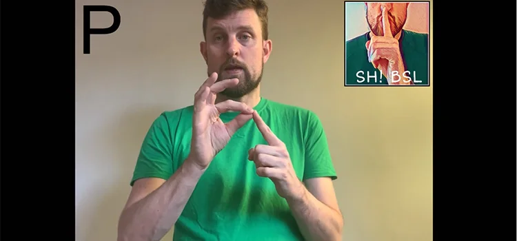 A Man Demonstrating How to Sign the Letter P