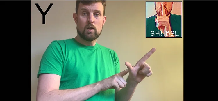 A Man Showing How to Sign the Letter Y