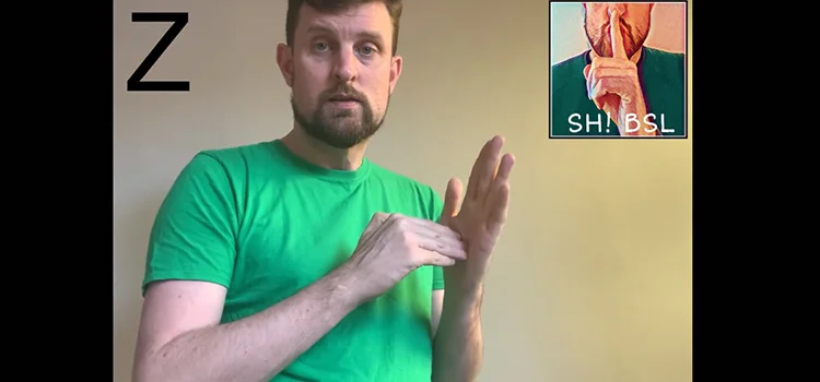 A Man Showing How to Sign the Letter Z
