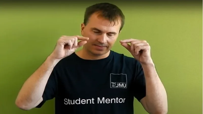 BSL tutor signing Sleep in British sign language