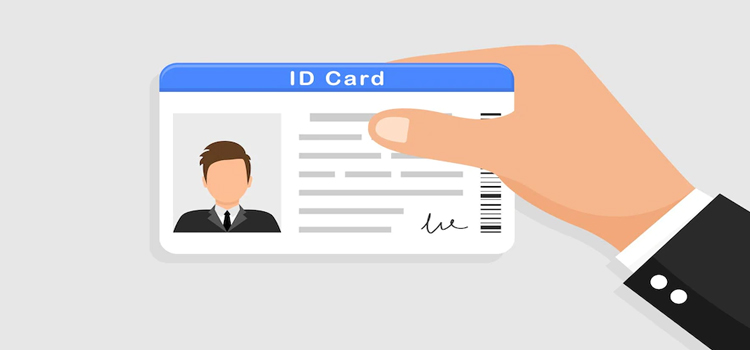 Student Holding Plastic Student ID Card