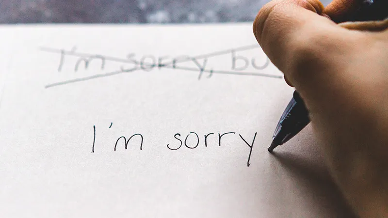 Writing I am sorry on paper