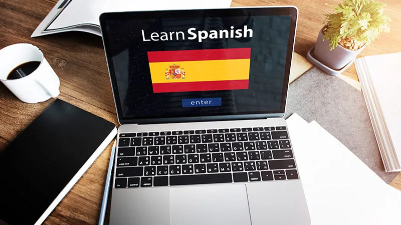 Learn Spanish written on a laptop screen
