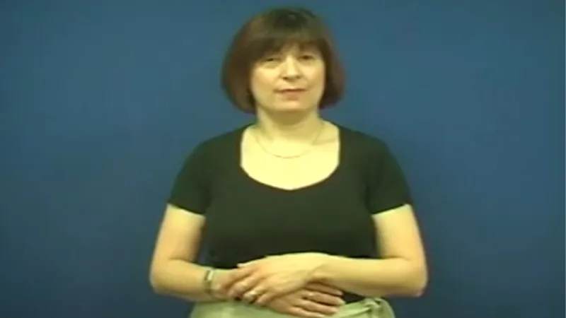 British Sign Language interpreter in a steady posture