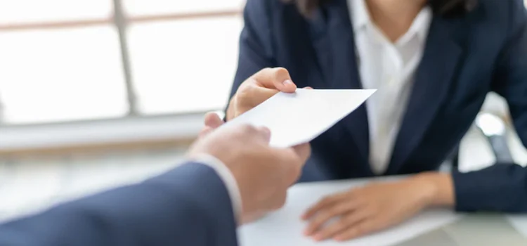 A Business Woman Receiving Salary from Her Employer 