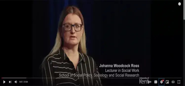 An image of Dr Johanna Woodcock Ross giving a public speech