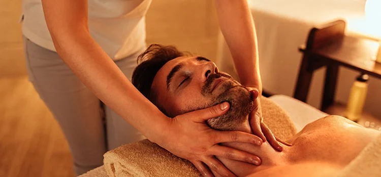 A man taking massage and relaxing