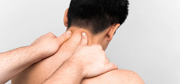 A man taking neck massage