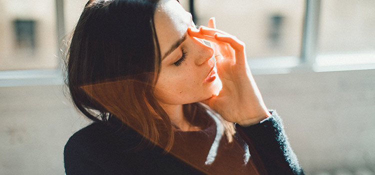 A woman facing dizziness