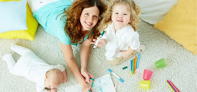 Top View of Child Enjoying Drawing with a Chilminder