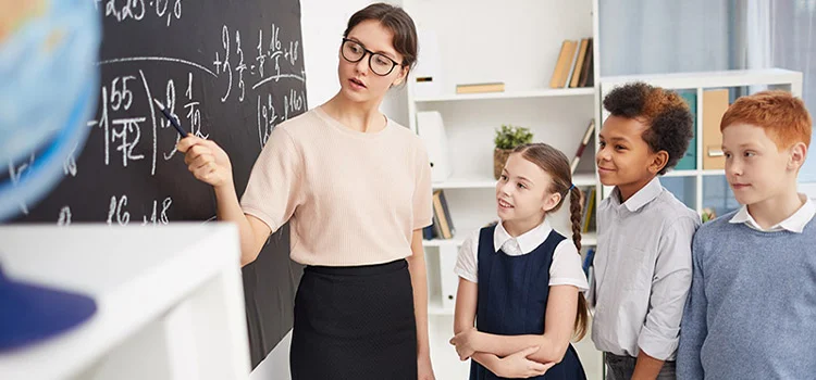Woman teaching few middle school kids maths