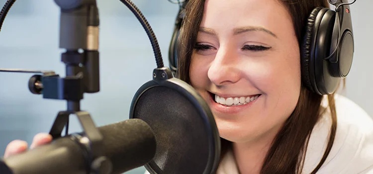 A female radio jockey while hosting a radio talk show