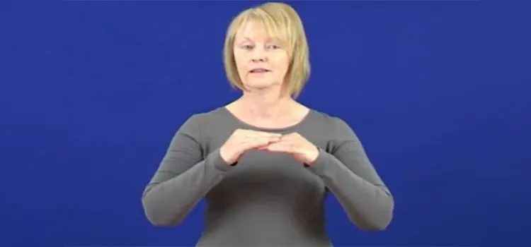 BSL tutor with both hands attached