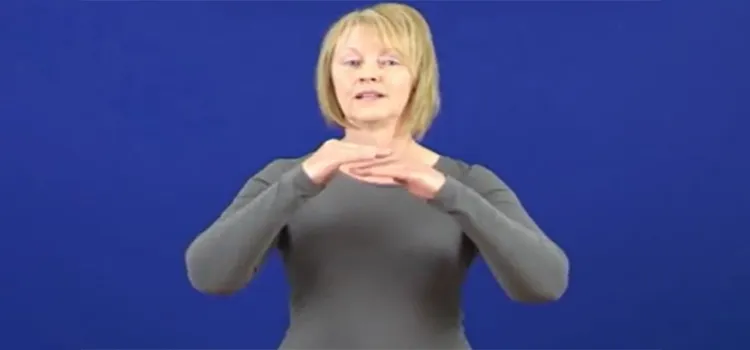 British Sign Language Teacher with one hand above the other