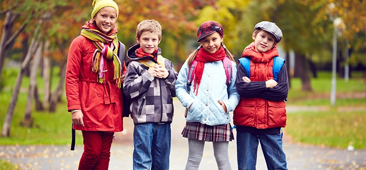 Four students are going to school together. 