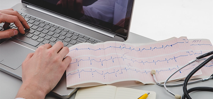 A healthcare worker looking for solutions after finding a borderline ECG report. 